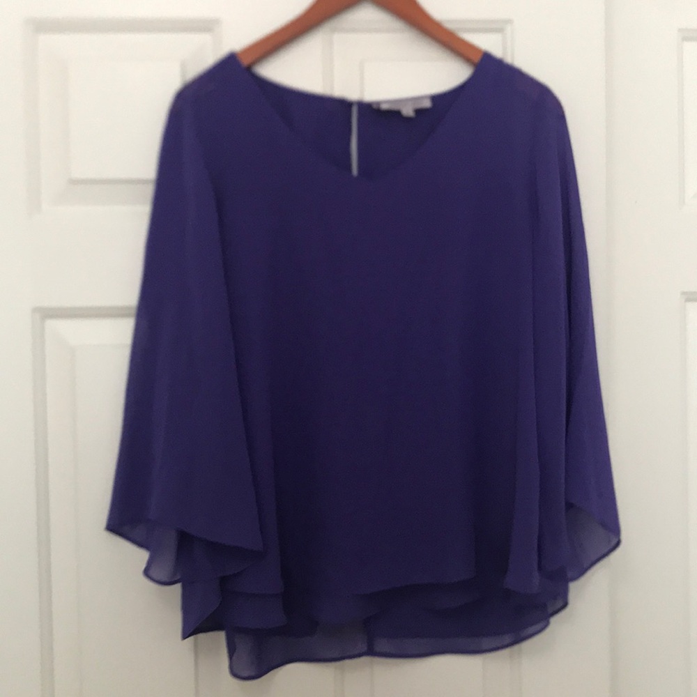 Jennifer Lopez blouse in M purple color